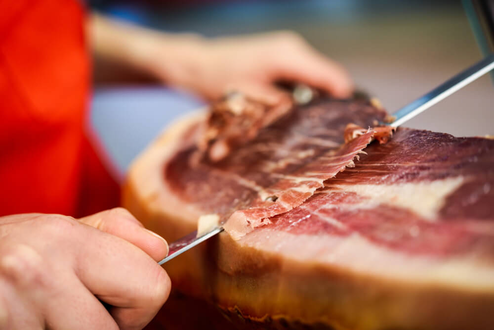 How to start slicing a ham or shoulder at home